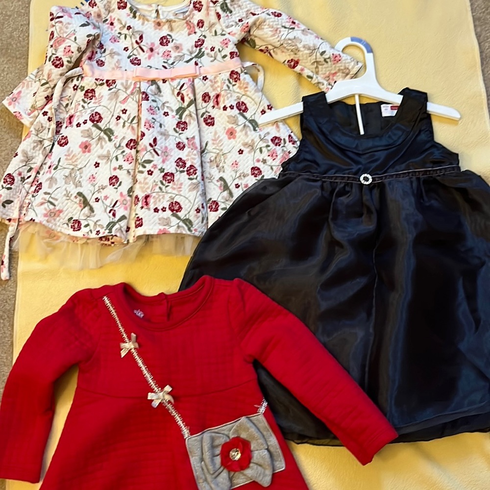 Girl’s dress( 1 black, 1 red, 1 with flowers)